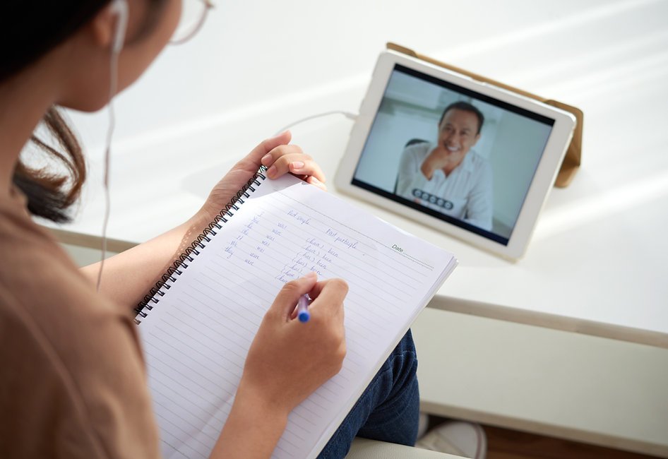 Asian woman studying English online